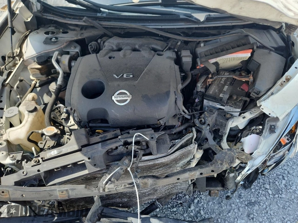 2014 Nissan Maxima S z VIN 1N4AA5AP9EC908047, wystawiony jako Copart lot #58530495 z przebiegiem 134 152 mil mil oraz Szkoda całkowita • Salvage title. Historia ofert i sprzedaży dostępna na DreamBid. Obrazek 11.