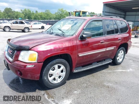 2003 GMC Envoy SLE z VIN 1GKDT13S732389048, wystawiony jako IAAI lot #42414696 z przebiegiem 215 253 mil mil oraz . Historia ofert i sprzedaży dostępna na DreamBid. Obrazek 2.