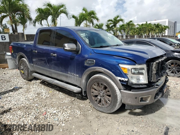 2017 Nissan Titan SL with VIN 1N6AA1E6XHN536129, listed as a Copart auction lot 60496415 with 132,269 mi miles and Salvage title. Bid and sale history available at DreamBid. Image 4.