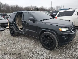 2014 Jeep Grand Cherokee Limited with VIN 1C4RJEBT5EC213332, listed as a Copart auction lot 87583515 with 152,409 mi miles and Salvage Title. Bid and sale history available at DreamBid. Image 4.