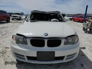 2010 BMW 1 Series 128i with VIN WBAUN1C5XAVH81789, listed as a Copart auction lot 49798465 with 128,859 mi miles and Clean title. Bid and sale history available at DreamBid. Image 5.