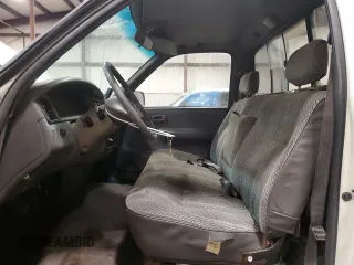 1993 Toyota T100 DX z VIN JT4VD10A0P0013396, wystawiony jako Copart lot #43002405 z przebiegiem 137 000 mil mil oraz Szkoda całkowita • Salvage title. Historia ofert i sprzedaży dostępna na DreamBid. Obrazek 7.