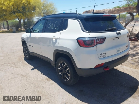 2019 Jeep Compass Trailhawk with VIN 3C4NJDDB4KT780239, listed as a IAAI auction lot 42095643 with 68,995 mi miles and . Bid and sale history available at DreamBid. Image 3.