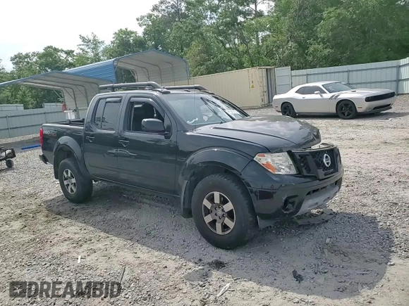 2012 Nissan Frontier Pro-4X z VIN 1N6AD0EV4CC405470, wystawiony jako Copart lot #54186715 z przebiegiem Nie podano mil oraz Szkoda całkowita • Salvage title. Historia ofert i sprzedaży dostępna na DreamBid. Obrazek 13.