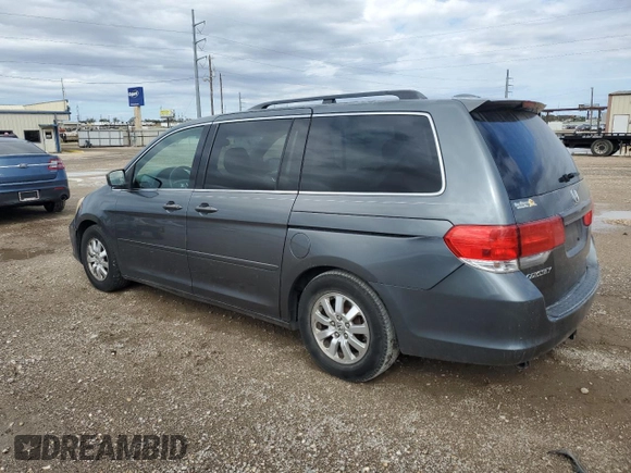 2010 Honda Odyssey EX-L with VIN 5FNRL3H72AB055070, listed as a Copart auction lot 80328974 with 221,467 mi miles and Salvage Title. Bid and sale history available at DreamBid. Image 2.
