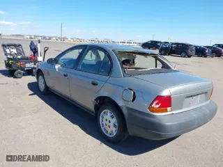 1999 Saturn SL with VIN 1G8ZH5282XZ169243, listed as a IAAI auction lot 41859519 with 224,157 mi miles. Bid and sale history available at carsss.com. Image 3.