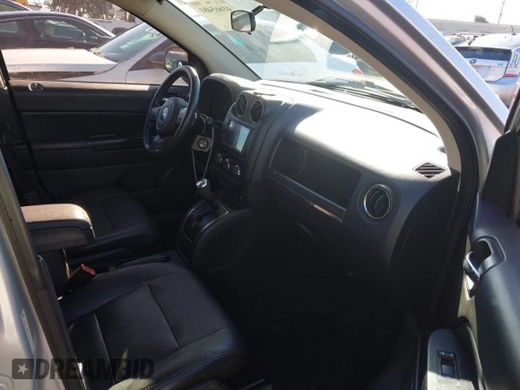 2011 Jeep Compass with VIN 1J4NT1FA4BD139153, listed as a IAAI auction lot 41665481 with 164,412 mi miles. Bid and sale history available at carsss.com. Image 5.