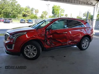 2024 Cadillac XT5 FWD Luxury with VIN 1GYKNAR42RZ738679, listed as a IAAI auction lot 42355530 with 14,660 mi miles and . Bid and sale history available at DreamBid. Image 14.