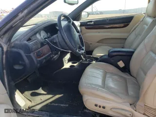 2001 Chrysler Sebring Limited with VIN 1C3EL65U11N620246, listed as a Copart auction lot 77750154 with 134,539 mi miles and Salvage Title. Bid and sale history available at carsss.com. Image 7.