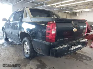 2011 Chevrolet Avalanche LS with VIN 3GNTKEE30BG375142, listed as a IAAI auction lot 41369489 with 127,165 mi miles. Bid and sale history available at carsss.com. Image 3.