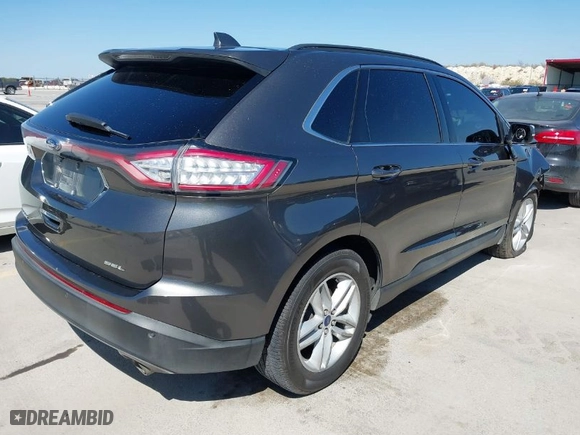 2018 Ford Edge SEL with VIN 2FMPK3J89JBC11871, listed as a IAAI auction lot 41778093 with 142,956 mi miles. Bid and sale history available at carsss.com. Image 4.