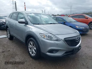2014 Mazda CX-9 Touring with VIN JM3TB3CA8E0437272, listed as a IAAI auction lot 40833160 with 153,267 mi miles. Bid and sale history available at carsss.com. Image 1.