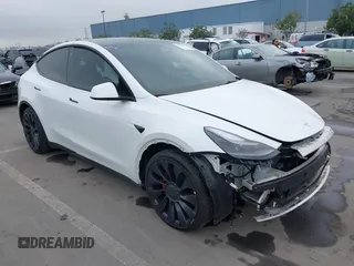 2022 Tesla Model Y Performance z VIN 7SAYGDEFXNF484838, wystawiony jako IAAI lot #41392095 z przebiegiem 8 728 mil mil oraz . Historia ofert i sprzedaży dostępna na DreamBid. Obrazek 1.