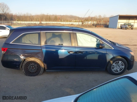 2014 Honda Odyssey LX with VIN 5FNRL5H27EB060223, listed as a IAAI auction lot 41771269 with 156,169 mi miles. Bid and sale history available at carsss.com. Image 13.