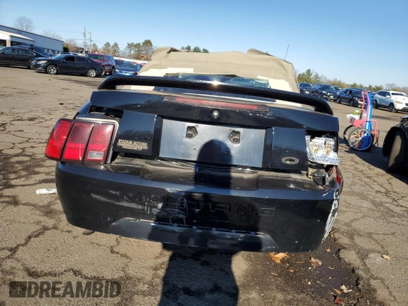 1999 Ford Mustang with VIN 1FAFP4443XF137375, listed as a Copart auction lot 82615074 with Not provided miles and Salvage title. Bid and sale history available at DreamBid. Image 6.