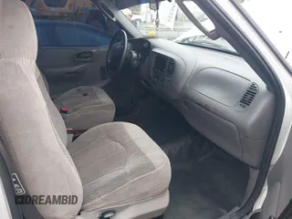 2002 Ford F-150 XL with VIN 1FTRF17242NB86232, listed as a IAAI auction lot 42336859 with 119,321 mi miles and . Bid and sale history available at DreamBid. Image 5.