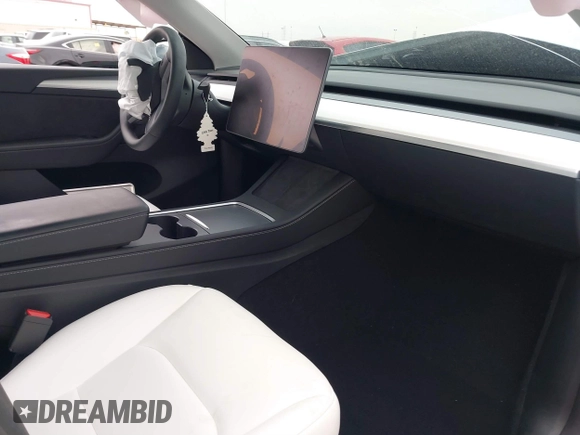 2024 Tesla Model Y with VIN 7SAYGDED6RF166543, listed as a IAAI auction lot 41713362 with Not Provided miles and . Bid and sale history available at DreamBid. Image 5.