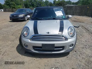 2012 MINI Convertible z VIN WMWZN3C51CT265186, wystawiony jako IAAI lot #42556739 z przebiegiem 118 747 mil mil oraz . Historia ofert i sprzedaży dostępna na DreamBid. Obrazek 6.