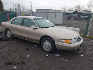 1997 Lincoln Continental with VIN 1LNLM97V3VY666104, listed as a IAAI auction lot 41650904 with 181,536 mi miles. Bid and sale history available at carsss.com. Image 1.
