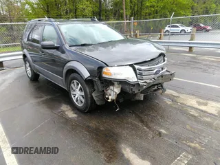 2008 Ford Taurus X SEL z VIN 1FMDK02W08GA28649, wystawiony jako IAAI lot #42026925 z przebiegiem 191 857 mil mil oraz . Historia ofert i sprzedaży dostępna na DreamBid. Obrazek 1.