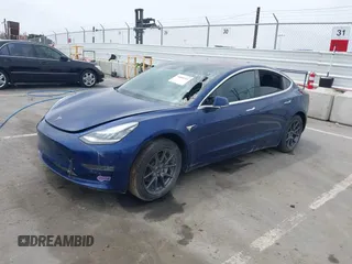 2018 Tesla Model 3 Long Range Battery with VIN 5YJ3E1EA1JF160350, listed as a IAAI auction lot 34606522 with 89,431 mi miles and . Bid and sale history available at DreamBid. Image 2.