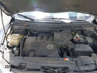2012 Mazda CX-9 Grand Touring z VIN JM3TB2DA3C0355617, wystawiony jako IAAI lot #42198050 z przebiegiem 185 852 mil mil oraz . Historia ofert i sprzedaży dostępna na DreamBid. Obrazek 10.