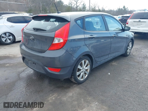 2012 Hyundai Accent SE with VIN KMHCU5AE4CU037411, listed as a IAAI auction lot 41659662 with 163,021 mi miles. Bid and sale history available at carsss.com. Image 4.