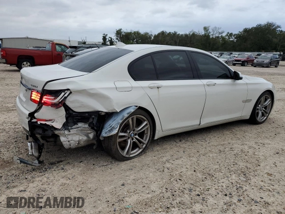 2013 BMW 7 Series 750i with VIN WBAYA8C54DC996569, listed as a Copart auction lot 74199774 with 107,871 mi miles and Salvage Title. Bid and sale history available at DreamBid. Image 3.