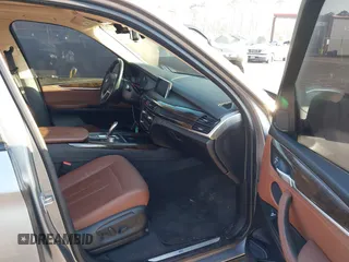 2016 BMW X5 xDrive40e with VIN 5UXKT0C57G0S75476, listed as a IAAI auction lot 41642249 with 105,489 mi miles and . Bid and sale history available at DreamBid. Image 5.