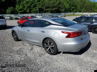 2016 Nissan Maxima S with VIN 1N4AA6AP6GC394148, listed as a Copart auction lot 57378635 with 129,799 mi miles and Salvage title. Bid and sale history available at DreamBid. Image 2.