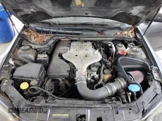 2008 Pontiac G8 z VIN 6G2ER57798L143560, wystawiony jako Copart lot #47386605 z przebiegiem 161 483 mil mil oraz Szkody całkowita. Historia ofert i sprzedaży dostępna na DreamBid. Obrazek 11.