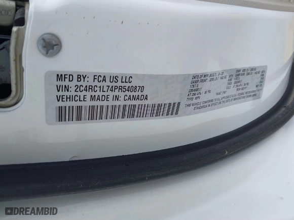 2023 Chrysler Pacifica Hybrid Touring L with VIN 2C4RC1L74PR540870, listed as a IAAI auction lot 42056528 with 46,940 mi miles. Bid and sale history available at carsss.com. Image 9.