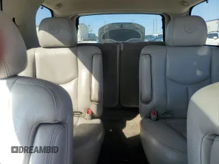 2003 Cadillac Escalade с VIN 1GYEC63T63R290034, выставлен на аукционе Copart как лот 46844735 с пробегом 304 433 миль миль и Чистый • Clean title. История ставок и продаж доступна на DreamBid. Изображение 10.