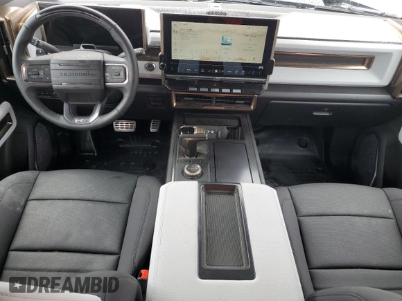 2024 GMC Hummer EV 2X z VIN 1GKB0NDE3RU110966, wystawiony jako Copart lot #79210474 z przebiegiem 3569 mil mil oraz Szkody całkowita. Historia ofert i sprzedaży dostępna na DreamBid. Obrazek 8.