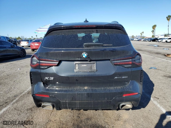 2023 BMW X3 xDrive30i with VIN 5UX53DP03P9P79117, listed as a Copart auction lot 46936995 with 3,710 mi miles and Salvage Title. Bid and sale history available at carsss.com. Image 6.