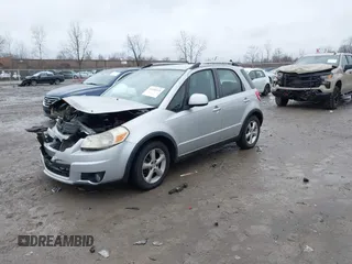 2007 Suzuki SX4 Man Touring Pkg AWD with VIN JS2YB417475102405, listed as a IAAI auction lot 41106931 with 170,315 mi miles. Bid and sale history available at carsss.com. Image 2.