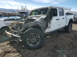 2022 Jeep Gladiator Rubicon с VIN 1C6JJTBM3NL107950, выставлен на аукционе Copart как лот 48883715 с пробегом Не указан миль и На запчасти • Non repairable. История ставок и продаж доступна на DreamBid. Изображение 1.