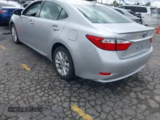 2015 Lexus ES 300h with VIN JTHBW1GG1F2084938, listed as a IAAI auction lot 41761844 with 69,854 mi miles and . Bid and sale history available at DreamBid. Image 3.