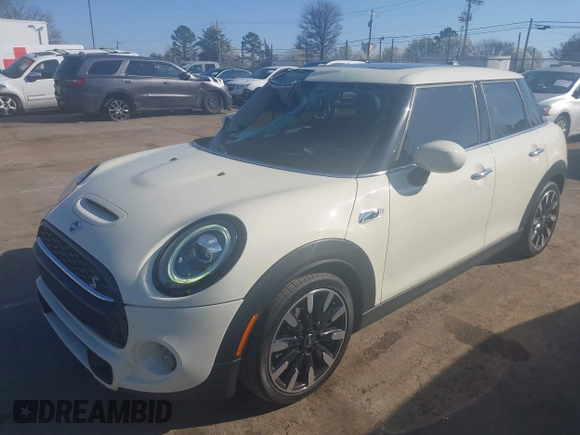 2021 MINI Hardtop 4 Door Cooper S with VIN WMWXU9C00M2P04693, listed as a IAAI auction lot 41785185 with 57,848 mi miles and . Bid and sale history available at DreamBid. Image 17.