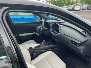 2025 Lexus UX 300h with VIN JTHUCJDH8S2003698, listed as a Copart auction lot 56182345 with 1,111 mi miles and Salvage Title. Bid and sale history available at DreamBid. Image 5.