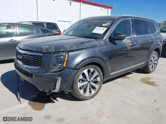2022 Kia Telluride S with VIN 5XYP6DHC6NG236642, listed as a IAAI auction lot 41696702 with 63,505 mi miles. Bid and sale history available at carsss.com. Image 2.