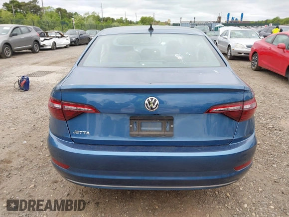 2021 Volkswagen Jetta S z VIN 3VWC57BU1MM070677, wystawiony jako IAAI lot #42312226 z przebiegiem 53 808 mil mil oraz . Historia ofert i sprzedaży dostępna na DreamBid. Obrazek 16.
