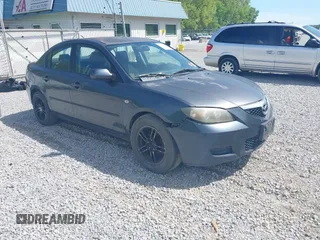 2009 Mazda 3 i Touring Value with VIN JM1BK32F291249221, listed as a IAAI auction lot 42006435 with 249,775 mi miles. Bid and sale history available at carsss.com. Image 1.