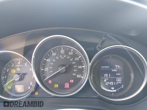 2016 Mazda CX-5 Sport with VIN JM3KE2BY2G0819604, listed as a IAAI auction lot 42059846 with 124,911 mi miles. Bid and sale history available at carsss.com. Image 7.
