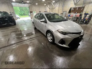 2018 Toyota Corolla L with VIN 5YFBURHE7JP780538, listed as a IAAI auction lot 42478173 with 106,751 mi miles and . Bid and sale history available at DreamBid. Image 1.