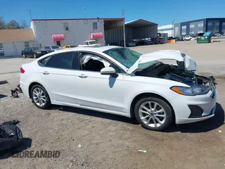 2020 Ford Fusion SE z VIN 3FA6P0LU8LR266686, wystawiony jako IAAI lot #41790126 z przebiegiem 95 314 mil mil oraz . Historia ofert i sprzedaży dostępna na DreamBid. Obrazek 13.