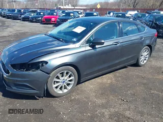 2017 Ford Fusion SE with VIN 3FA6P0H75HR401388, listed as a IAAI auction lot 41868407 with 147,102 mi miles and . Bid and sale history available at DreamBid. Image 2.