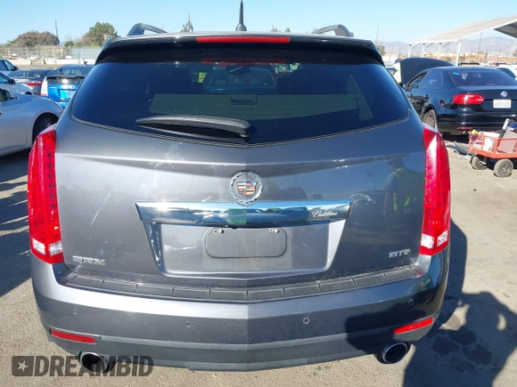 2013 Cadillac SRX Premium Collection z VIN 3GYFNEE37DS525612, wystawiony jako IAAI lot #41344221 z przebiegiem 119 573 mil mil oraz . Historia ofert i sprzedaży dostępna na DreamBid. Obrazek 17.