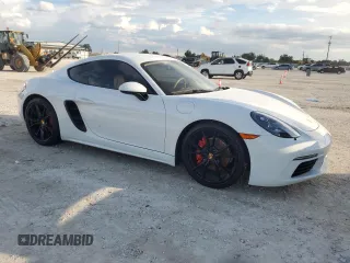 2017 Porsche Cayman S с VIN WP0AB2A83HS285419, выставлен на аукционе Copart как лот 73873894 с пробегом Не указан миль и Списание • Salvage title. История ставок и продаж доступна на DreamBid. Изображение 4.