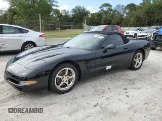 2002 Chevrolet Corvette with VIN 1G1YY32G325123703, listed as a Copart auction lot 77258804 with 26,325 mi miles and Salvage Title. Bid and sale history available at carsss.com. Image 1.